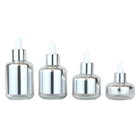 Ensemble de flacons compte-gouttes en verre argenté miroir, conteneur de sérum finition chrome, emballage cosmétique de luxe, plusieurs tailles, logo personnalisé