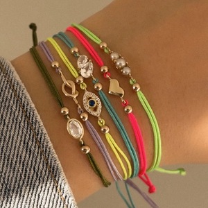 Joyería al por mayor para mujer, pulseras de cuerda con borlas personalizadas, Zirconia, forma infinita, amor, pulseras de amistad trenzadas, pilas - Product Image 1