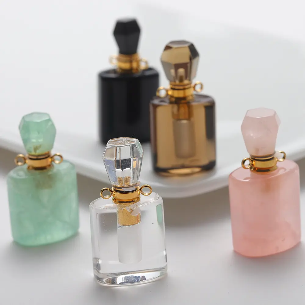 Botella vacía de perfume tallada a mano con piedra de cristal de roca natural, botellas de aceite con diseño personalizado, venta al por mayor