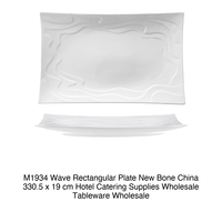 Assiette rectangulaire ondulée 330,5 × 19 cm en porcelaine fine M1934