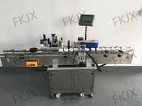 Machine d'étiquetage de bouteilles rondes de haute précision FKJX avec écran tactile PLC pour les contenants de liquides chimiques quotidiens