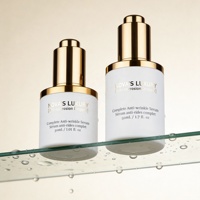 Flacons compte-gouttes cosmétiques haut de gamme 30ml 50ml en verre blanc mat pour parfum, huile et sérum avec compte-gouttes à pression en aluminium doré
