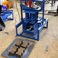 Machine automatique de fabrication de mini-blocs creux WJ 2-45B à faible coût, facile à utiliser pour les projets de démarrage, en stock pour le Mozambique