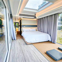 Maison de capsule spatiale fabriquée en usine Petite maison de capsule Mobiles futuristes Maison de capsule modulaire à panneau sandwich pour vivre
