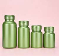Flacon en plastique PET vert avec bouchon à clapet, vide, pour le stockage de capsules, comprimés, vitamines et suppléments