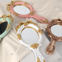 Luxe Européen Portable Ovale En Relief Rose Voyage Princesse Métal Cosmétique De Poche Maquillage Vintage Main Miroirs Avec Poignée