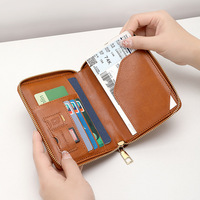 Nouvel étui de voyage en cuir PU pour passeport, avec blocage RFID, sac familial pour passeports et certificats, porte-cartes de banque portable