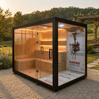 Ruang Sauna Rumah Terbuka dengan Kabin Kaca dan Interior Kayu untuk Spa di Halaman Belakang, Retret Taman, dan Penggunaan Wellness Resort