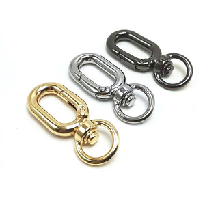 Llavero ovalado con anilla de resorte de aleación de zinc, colores oro claro, plata y bronce, con gancho giratorio y hebilla metálica para cinturón - Product Image 1