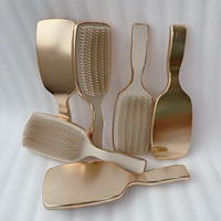 Brosse démêlante professionnelle populaire en chrome doré électroplaqué pour soins capillaires, personnalisable avec logo sur mesure