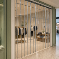 Porte de magasin pliante manuelle moderne en cristal PC, cadre en aluminium fini, solution complète pour usage commercial en centre commercial