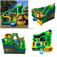 Château gonflable commercial d'extérieur sur le thème des animaux avec toboggan et mur d'escalade, idéal pour les fêtes en extérieur