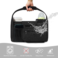 Organisateur universel double pour poussette avec sac en filet amovible, porte-gobelets isothermes surélevés et crochets antidérapants sécurisés