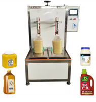 Machine de remplissage gravimétrique pour engrais liquides agricoles, lubrifiants et fûts de produits chimiques industriels