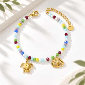 Bracelet en acier inoxydable multicolore avec breloques tortue et coquillage, plaqué or 18 carats sous vide - Product Image 1