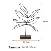 Maroquinerie en fil de fleurs en métal directement à l'usine, décoration artistique moderne, motif feuille montres, esthétique minimaliste avec support