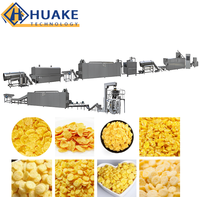 Ligne de production automatique de céréales pour le petit-déjeuner, machine extrudeuse à double vis pour la fabrication de flocons de maïs et de céréales croustillantes