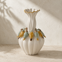 Vase à fleurs en céramique 3D en forme d'oiseau, inspiré de la nature, avec bord doré, pour décoration de table, console ou intérieur.