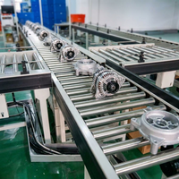 Convoyeur à rouleaux industriel portable à gravité pour le déplacement de cartons et de fûts lourds
