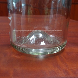 Botella de vidrio redonda de 1 litro con base con hoyuelos para <span class=keywords><strong>whisky</strong></span>, venta al por mayor de fábrica - Product Image 2