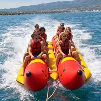 Bateau banane gonflable géant personnalisé rouge et jaune, type requin volant, à double tube, tractable, pour la location et les activités nautiques en gros