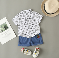 Ensemble décontracté deux pièces chemise et short pour garçons, vêtements de plage de créateur pour tout-petits, tenues d'été pour enfants, combinaison bébé à motif dessin animé