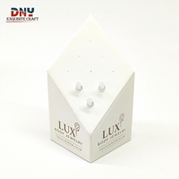 Ensemble de présentoirs pour bijoux de piercing en cuir PU blanc avec logo argenté personnalisé et pinces en plastique pour bijoux corporels