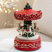 Boîte à musique en résine avec carrousel rotatif et mini sapin de Noël pour la décoration de table de Noël et un cadeau surprise de fêtes
