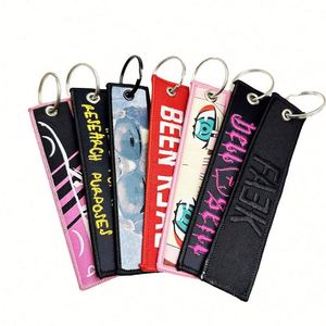 Manufacturer Customized Embroidery Woven Flying Key Chain Premium Keychains - Product Image 1