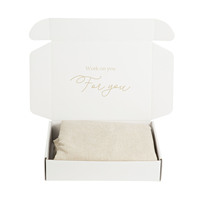 Boîte pliable en carton ondulé blanc de qualité supérieure pour l'emballage de vêtements féminins simples, chemises et costumes, idéale pour les voyages en avion