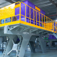 Déchiqueteur robuste à double arbre pour déchets plastiques, palettes, conteneurs IBC, pare-chocs, filtres à huile et fûts de tonne