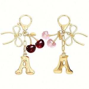 Llavero Metálico Retro con Letra Burbuja y Lazo Decorativo, Color Rosa Cereza, Ideal para Colgante de Bolso de Mujer, Regalo, Venta al por Mayor - Product Image 1