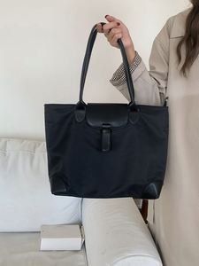 กระเป๋าผ้าแคนวาสสีพื้นเรียบง่าย สายสะพายไหล่สีพื้น ขนาดใหญ่ จุของได้เยอะ ปรับแต่งลวดลายได้ มีช่องใส่ของ - Product Image 6