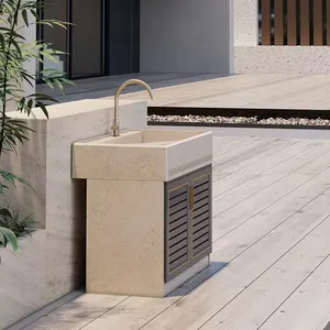 Lavabo en marbre beige jura au design moderne avec planche à laver et évier intégré