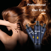 Shampooing et après-shampoing à l'huile d'argan marocaine naturelle, utilisés pour hydrater et réparer les cheveux abîmés, nourrissant le cuir chevelu