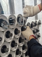 Galet de roulement suspendu en acier de haute qualité et durable pour convoyeur à rouleaux, idéal pour les systèmes de manutention de matériaux