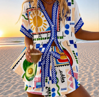 Ensemble deux pièces pour femme, style vacances à la plage transfrontalières, avec chemisier fleuri et haut imprimé à manches courtes pour l'été et l'automne