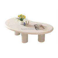 Table basse en bois blanc nordique en forme de nuage pour salon moderne