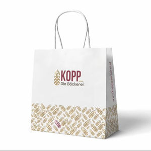 Bolsa de papel Kraft blanca con mango trenzado impreso personalizado diseñada para uso diario ligero con aspecto ecológico y limpio - Product Image 1