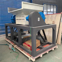Nouveau en stock déchiqueteuse à Double arbre de haute qualité pour la machine de déchiquetage de déchets en plastique de pulvérisation de déchets