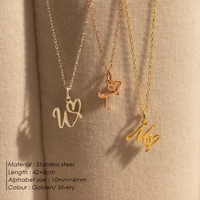 EMANCO Collier minimaliste chic avec initiale en forme de cœur, lettre manuscrite, chaîne à maillons en acier inoxydable doré/argenté, pour femme, idéal pour les soirées et la mode