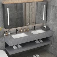 Meuble-lavabo double vasque mural avec finition en marbre gris, doté d'une vasque en céramique avec rangement, adapté aux hôtels