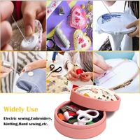 Kit de couture rond pour la maison avec couvercle coussin à épingles, organisateur portable d'aiguilles et de fils, et outils de réparation complets pour le bricolage à domicile