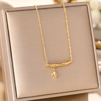 TG-1025 Collier pas cher en acier inoxydable plaqué or 18 carats pour femme, pendentif sourire papillon, coquillage, cœur, cadenas, bijou cadeau