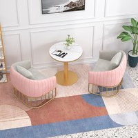 Style nordique simple moderne petite famille magasin de vêtements canapé lumière luxe métal canapé table basse combinaison loisirs canapé chaise