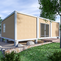 Conteneur habitable plat en acier de 40 pieds, fabriqué par DXH, avec panneaux sandwich, roues, design moderne et taille personnalisable.