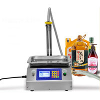 Remplisseuse de bouteilles en verre semi-automatique de bureau / Machine de remplissage de liquides numérique haute précision