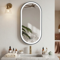Miroir mural ovale illuminé par LED intelligent de style moderne, cadre en aluminium noir mat avec fonction anti-buée pour la douche