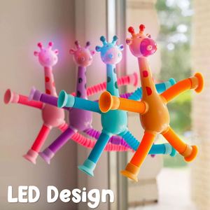 Jouet créatif et amusant en forme de girafe télescopique avec ventouse, tubes lumineux LED en plastique, jouets anti-stress - Product Image 1