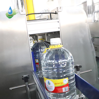Machine automatique monobloc 3 en 1 pour le lavage, le remplissage et le bouchage de bouteilles PET de 5L, 6 litres et 10L d'eau pure et minérale en bouteille